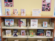 Children's book display with lots of posters and picture books